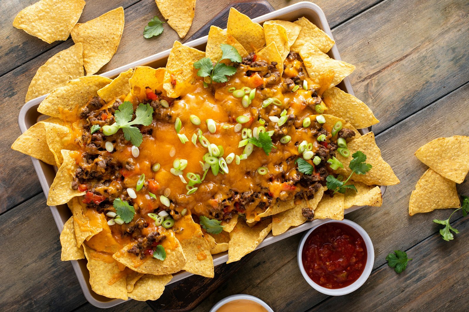 Traditional nachos with ground beef and red pepper