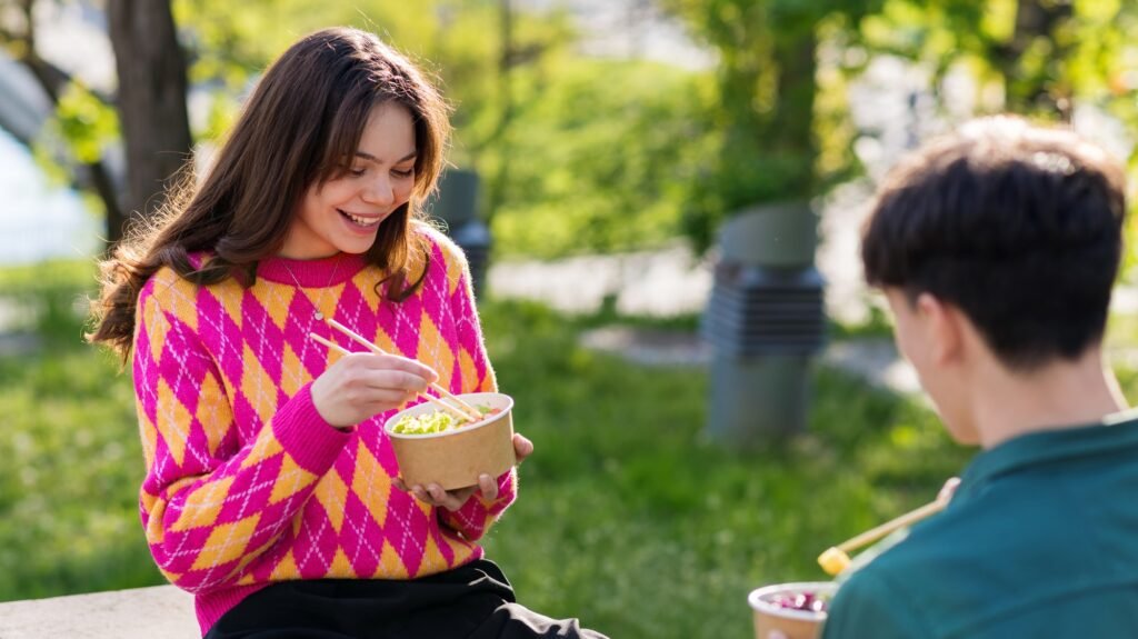 A couple eating poke